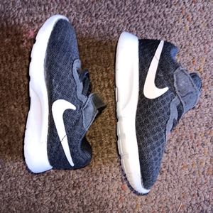 Nike baby shoes black and white size 5c